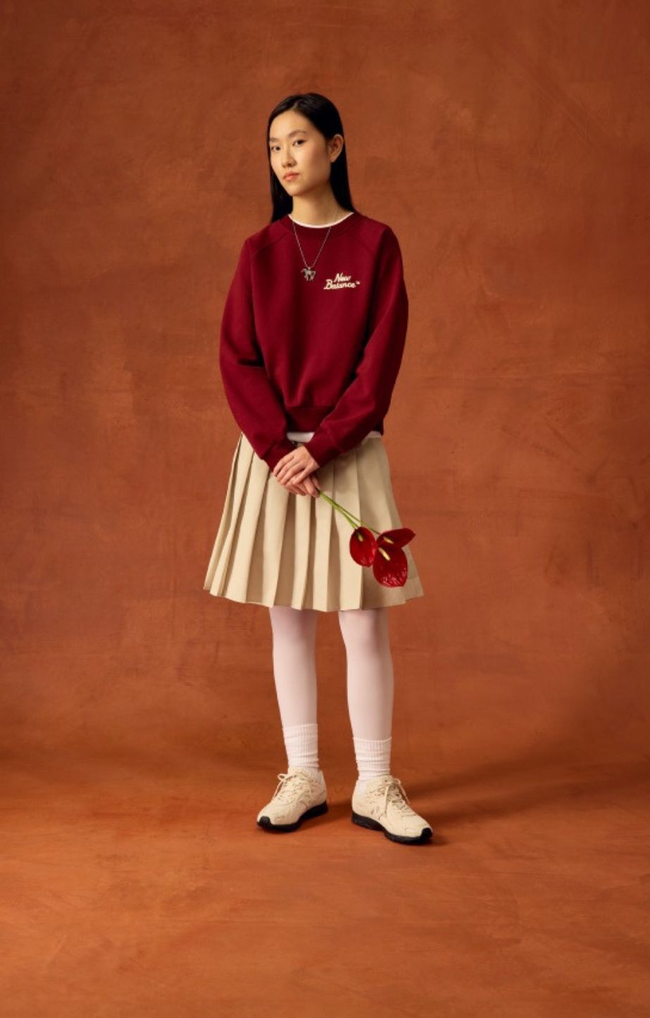 Person wearing new balance 204s